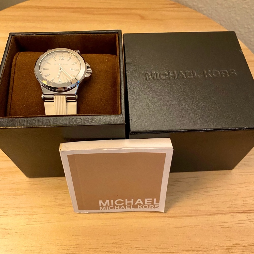 Michael Kors brand white band with stainless steel watch.